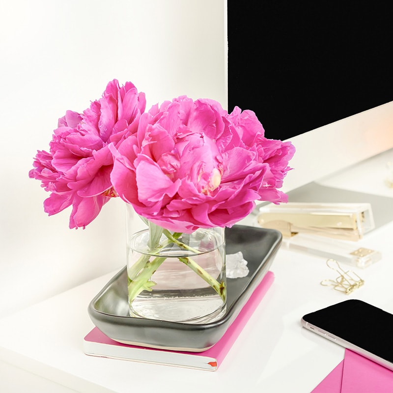 pink flowers on a desk